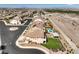 Lovely aerial view of property with a private pool, pergola, and immaculate landscaping in an upscale neighborhood at 228 Via Vallisneri, Henderson, NV 89011