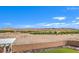 Enjoy serene views of the surrounding desert landscape from this private backyard retreat with synthetic lawn at 228 Via Vallisneri, Henderson, NV 89011