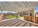 This spacious covered patio has lighting and plenty of room for dining and entertaining at 228 Via Vallisneri, Henderson, NV 89011