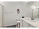 Modern bathroom features a glass-enclosed shower, and a sleek vanity with white countertop at 25 Barbara Ln # 38, Las Vegas, NV 89183