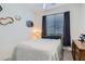 Comfortable bedroom features a cozy bed, neutral walls, and a dresser at 25 Barbara Ln # 38, Las Vegas, NV 89183