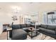 Bright living room with open floor plan, modern decor, and comfortable seating area at 25 Barbara Ln # 38, Las Vegas, NV 89183