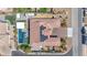 Expansive aerial view showcasing the entire property, from its pool to the solar panels on the roof at 274 Chartan Ave, Las Vegas, NV 89183