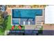 Aerial view of rectangular backyard pool with sunbeds, lounge chairs, and luscious lawn at 274 Chartan Ave, Las Vegas, NV 89183