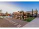 Entertaining backyard with a covered grill area, built in lighting, artificial turf, and swimming pool at 274 Chartan Ave, Las Vegas, NV 89183