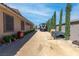 Spacious driveway and side yard with possible RV or boat parking and low maintenance landscaping at 274 Chartan Ave, Las Vegas, NV 89183