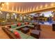 A beautiful covered patio with an outdoor seating area and views of the pool and backyard at 274 Chartan Ave, Las Vegas, NV 89183