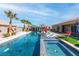 Beautiful backyard pool features sunbeds, spa, and lovely landscaping for outdoor living at 274 Chartan Ave, Las Vegas, NV 89183