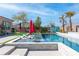 Backyard pool with sunbeds and spa features lush landscaping and tranquil outdoor living at 274 Chartan Ave, Las Vegas, NV 89183