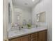 Bright bathroom with dual sinks, modern fixtures, and white marble countertop at 2822 Soft Horizon Way, Las Vegas, NV 89135