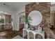 Beautiful foyer with stone accents leading to a dining area and featuring elegant decor at 2822 Soft Horizon Way, Las Vegas, NV 89135