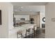 Modern kitchen featuring a breakfast bar with seating and stainless steel appliances at 2822 Soft Horizon Way, Las Vegas, NV 89135