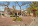Backyard with a covered patio and mature landscaping, creating a peaceful oasis for relaxation and enjoyment at 3020 Ripon Dr, Las Vegas, NV 89134