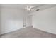 Bedroom featuring neutral walls, carpet, and a doorway leading to another room at 3020 Ripon Dr, Las Vegas, NV 89134