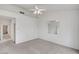 Spacious bedroom with neutral carpet and a ceiling fan for added comfort at 3020 Ripon Dr, Las Vegas, NV 89134