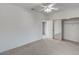 Bedroom featuring carpet, a mirrored closet, and access to another room at 3020 Ripon Dr, Las Vegas, NV 89134