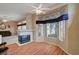 Spacious living area features a fireplace, a bay window, and hardwood flooring at 3020 Ripon Dr, Las Vegas, NV 89134
