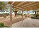 Covered patio provides the perfect spot for outdoor lounging overlooking the backyard at 3020 Ripon Dr, Las Vegas, NV 89134