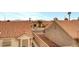 Sun City Summerlin home, featuring a tile roof and desert landscaping at 3020 Ripon Dr, Las Vegas, NV 89134