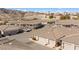 Aerial view of desert townhomes with tile roofs and mountain views at 3362 Pheasant Canyon Way # 1005, Laughlin, NV 89029