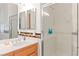 Bathroom featuring a single sink, walk-in shower and decoratively bordered walls at 3362 Pheasant Canyon Way # 1005, Laughlin, NV 89029