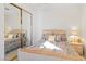Inviting bedroom with mirrored closet doors, decorative bed frame, and coordinated decor at 3362 Pheasant Canyon Way # 1005, Laughlin, NV 89029