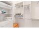 Well-organized walk-in closet with ample shelving, hanging space, and storage options at 3362 Pheasant Canyon Way # 1005, Laughlin, NV 89029