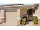Townhome featuring neutral paint, tile roof, and low-maintenance landscaping at 3362 Pheasant Canyon Way # 1005, Laughlin, NV 89029