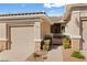 Townhome featuring neutral paint, tile roof, and low-maintenance landscaping at 3362 Pheasant Canyon Way # 1005, Laughlin, NV 89029
