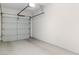 Well-maintained garage, showcasing the door, painted walls, and plenty of space for parking and storage at 3362 Pheasant Canyon Way # 1005, Laughlin, NV 89029