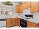 Functional kitchen with light-colored cabinets, modern appliances, and ample counter space at 3362 Pheasant Canyon Way # 1005, Laughlin, NV 89029