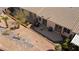 Private patio with barbeque, table, and desert landscaping at 3362 Pheasant Canyon Way # 1005, Laughlin, NV 89029