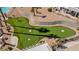 Aerial view of a putting green featuring artificial turf and desert landscaping at 3362 Pheasant Canyon Way # 1005, Laughlin, NV 89029