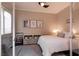 Bright bedroom with surf decor and a comfortable bed at 3920 Eiderdown Pl, North Las Vegas, NV 89084