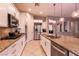 Modern kitchen featuring stainless steel appliances and granite countertops at 3920 Eiderdown Pl, North Las Vegas, NV 89084