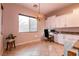 Cozy kitchen nook with a desk and ample natural light at 3920 Eiderdown Pl, North Las Vegas, NV 89084