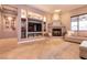 Inviting living room with fireplace, built-in shelves, and comfortable seating at 3920 Eiderdown Pl, North Las Vegas, NV 89084