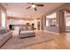 Open-concept living area with tile flooring, recessed lighting and seamless flow into the modern kitchen at 3920 Eiderdown Pl, North Las Vegas, NV 89084
