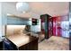 Sleek kitchen with stainless steel appliances, countertop seating, and a pendant light at 4381 W Flamingo Rd # 2605, Las Vegas, NV 89103