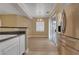 A kitchen sink is featured with view to the eating area with stainless steel appliances at 4685 Apulia Dr # 202, North Las Vegas, NV 89084
