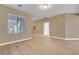 Bright living room showcasing light hardwood floors, neutral walls, and modern accents at 4685 Apulia Dr # 202, North Las Vegas, NV 89084