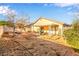Spacious backyard with covered patio, low-maintenance desert landscaping, and privacy at 5019 Cactus Mesa Way, North Las Vegas, NV 89031