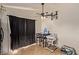 Casual dining area with tile flooring, ceiling fan, and minimalist decor at 5019 Cactus Mesa Way, North Las Vegas, NV 89031