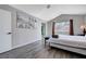 Inviting bedroom with a bed, artwork and side tables; natural light at 5049 Hibbetts Ct, Las Vegas, NV 89103