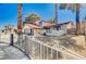 Charming two-story home with a well-maintained front yard and a two car garage at 5049 Hibbetts Ct, Las Vegas, NV 89103