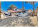 Charming two-story home with a well-maintained front yard and a two car garage at 5049 Hibbetts Ct, Las Vegas, NV 89103