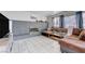 Bright living room featuring fireplace, tile floors, and lots of natural light at 5049 Hibbetts Ct, Las Vegas, NV 89103