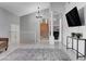 Spacious living room boasts a vaulted ceiling, tile floors, and a modern design at 5049 Hibbetts Ct, Las Vegas, NV 89103