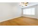 Unfurnished bedroom with bright natural light and hardwood flooring at 5130 Mandalay Springs Dr # 102, Las Vegas, NV 89120