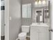 Neutral bathroom boasts a modern vanity with storage and updated fixtures at 537 Inness Ave, Henderson, NV 89011